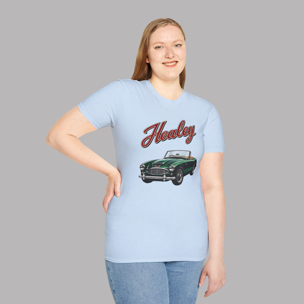 Woman wearing a light blue t-shirt with a green classic car graphic and 'Healey' text on a gray background