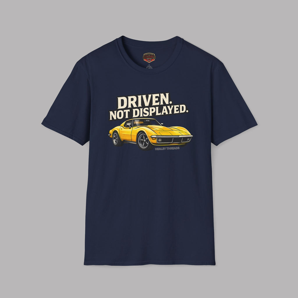 Navy blue t-shirt with a yellow muscle car graphic and text on a gray background