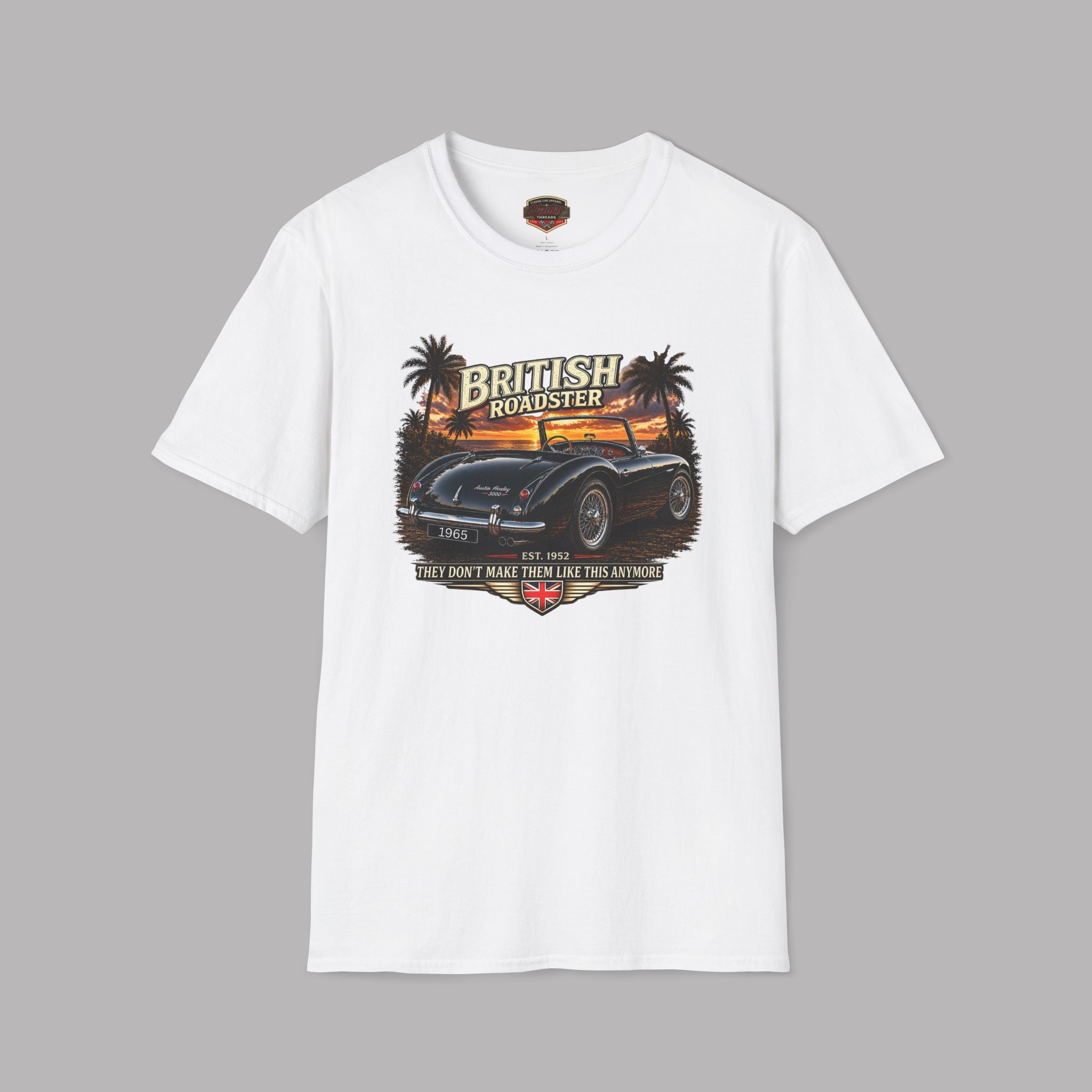 White t-shirt with a graphic design of a car and 'British Roadster' text on a gray background