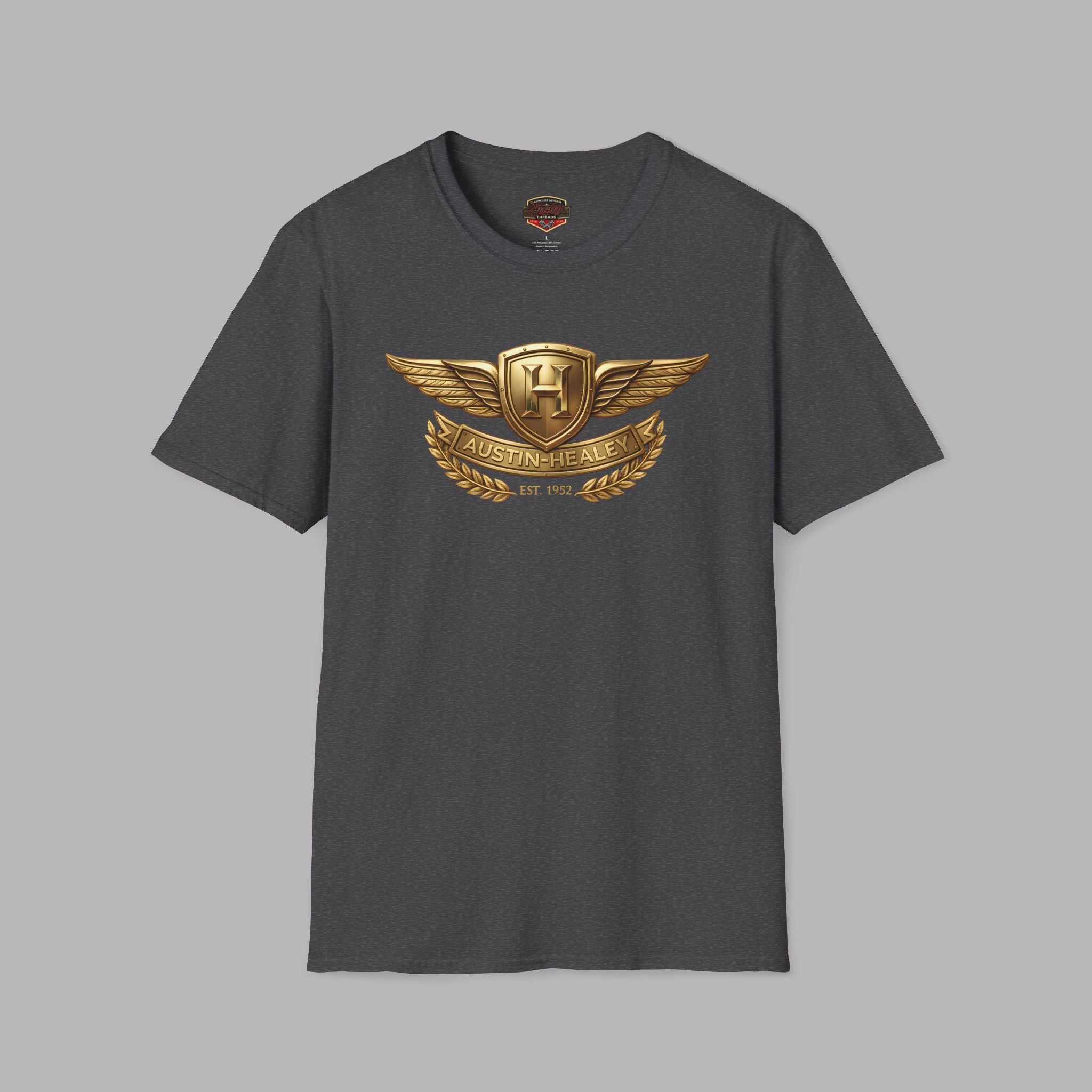 Dark heather t-shirt with a gold Healey emblem on a gray background