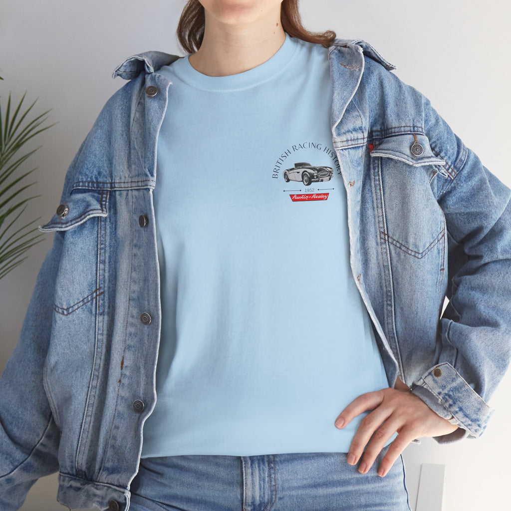 Person wearing a light blue denim jacket over a matching light blue t-shirt with a Healey graphic design.
