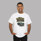 Man wearing a white t-shirt with a classic car graphic design and text on a gray background