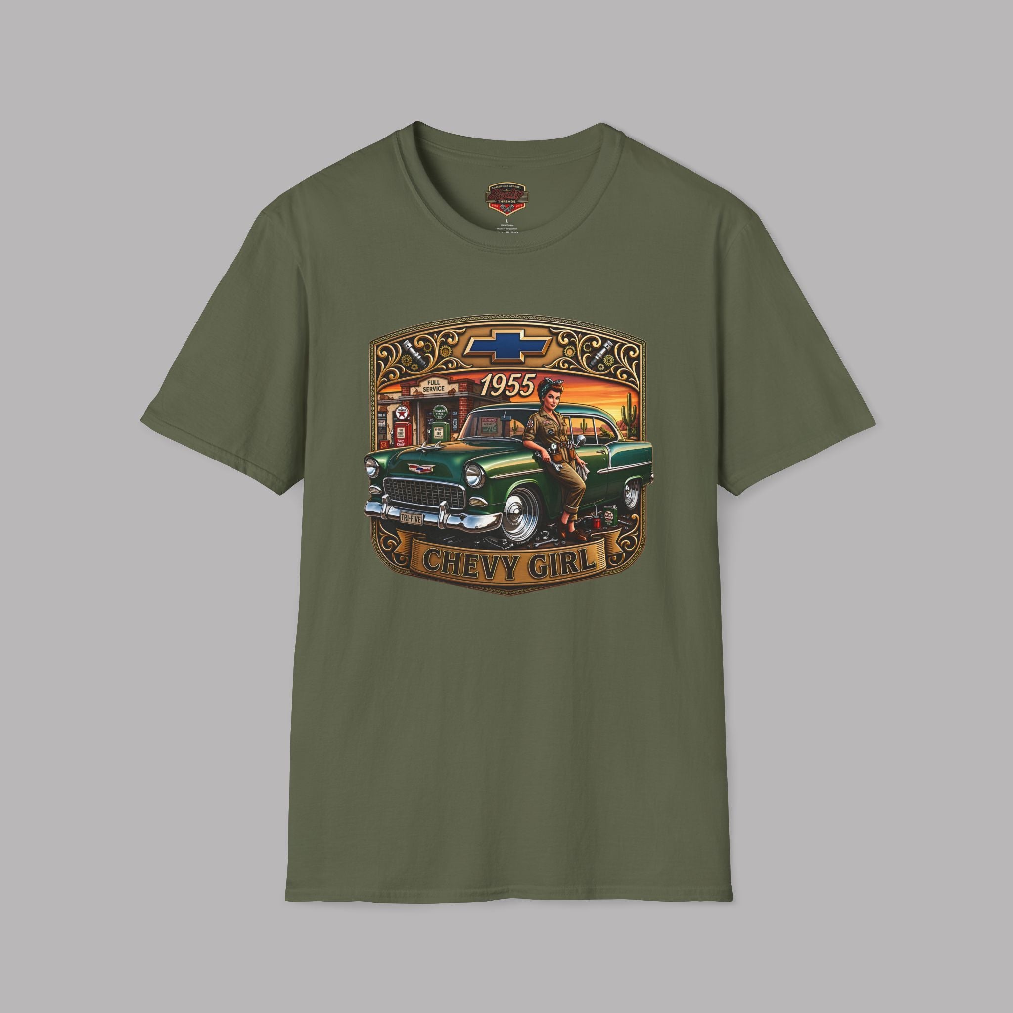 An military green short-sleeve t-shirt with a vintage-style graphic on the chest featuring a green 1955 Chevy truck and the text 'CHEVY GIRL' with the Chevrolet bowtie logo.