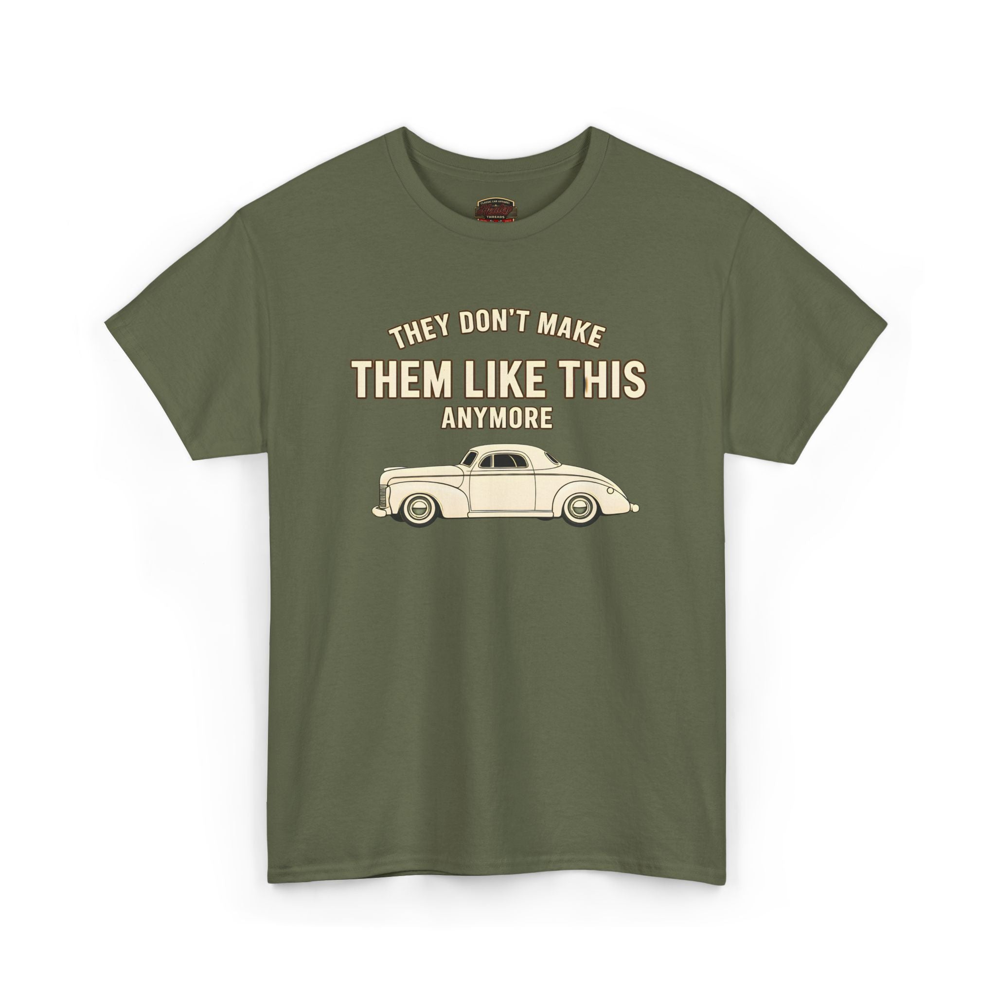 Military green t-shirt with vintage car graphic and text on a white background