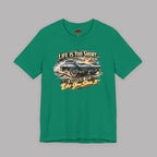 Kelly green t-shirt with a classic car graphic design and text on a gray background