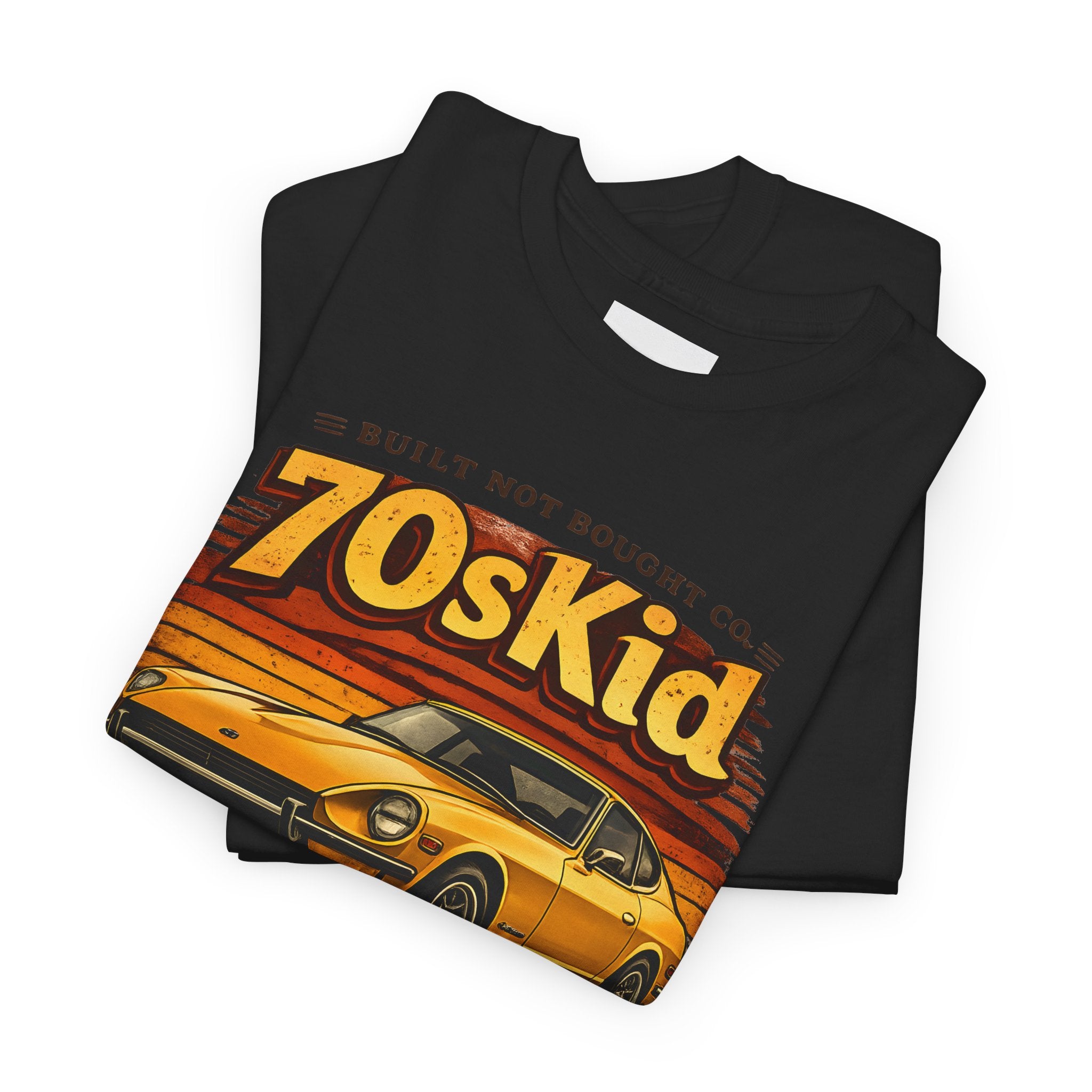 Folded black t-shirt with '70s Kid' graphic design on a white background