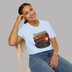 Woman wearing a light blue t-shirt with an 'American Muscle' car graphic design.