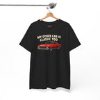 Black t-shirt with red car graphic and text 'My other car is classic too' on a hanger against a white background