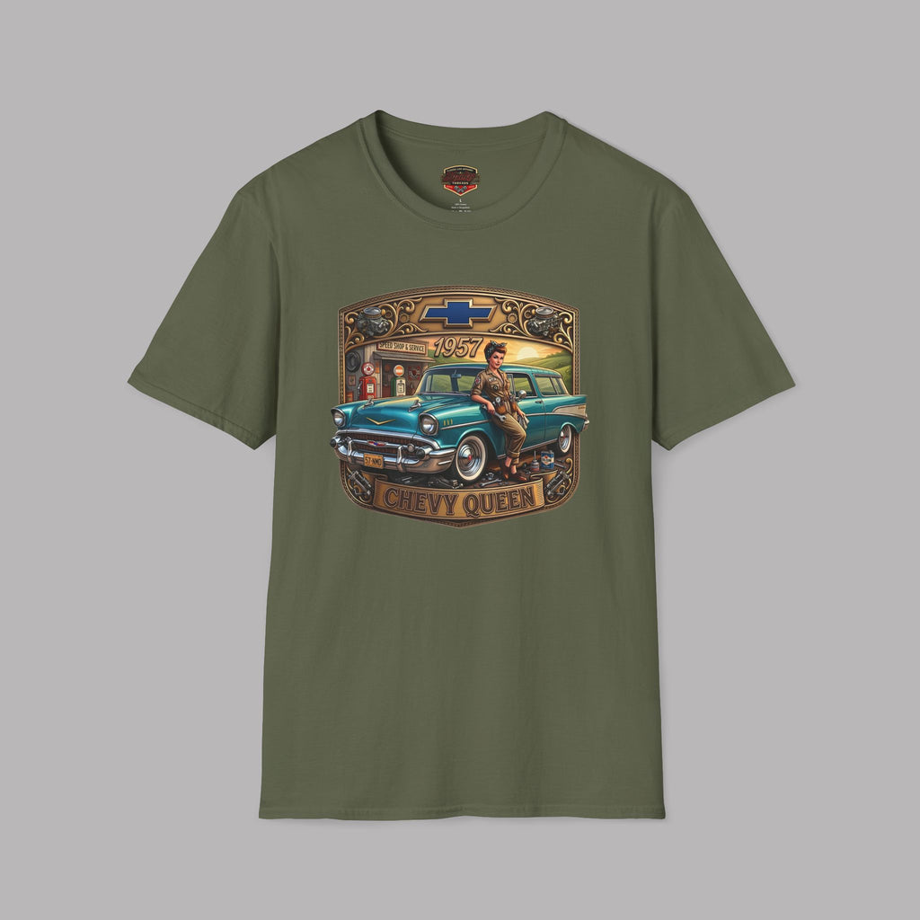 A military green short-sleeve crewneck t-shirt featuring a vintage-style graphic print of a teal 1957 Chevrolet station wagon with a woman sitting on it, framed by a gold and brown border with the text 'CHEVY QUEEN'.