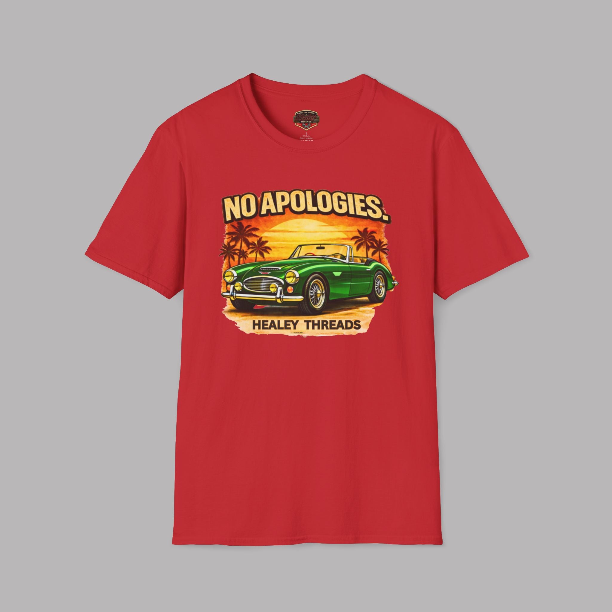 Red t-shirt with a graphic of a green Healey car, palm trees, and 'No Apologies' text on a gray background