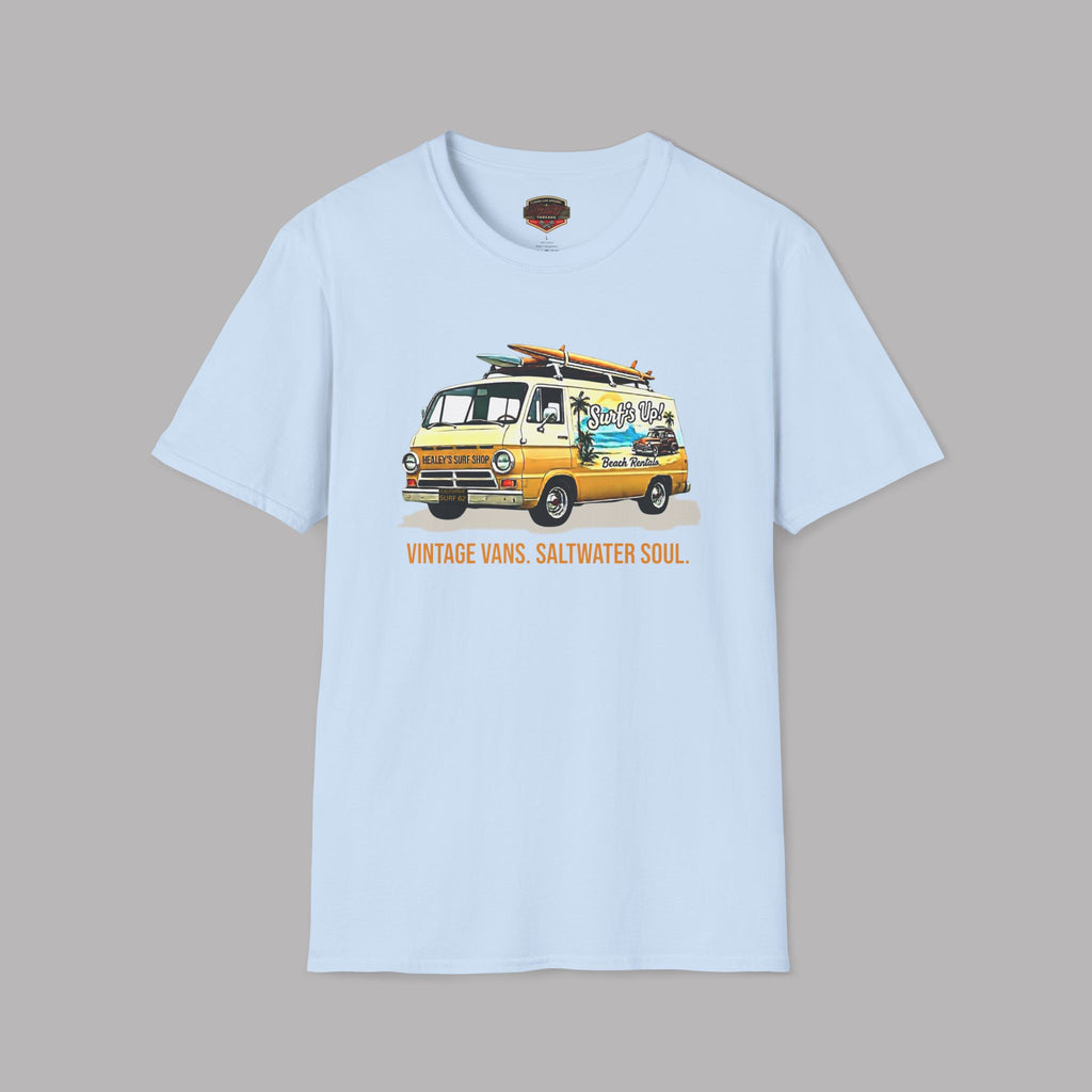Light blue t-shirt with a van and surfboard graphic on a gray background