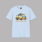 Light blue t-shirt with a van and surfboard graphic on a gray background