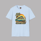 Light blue t-shirt with a graphic design of a van and palm trees on a gray background