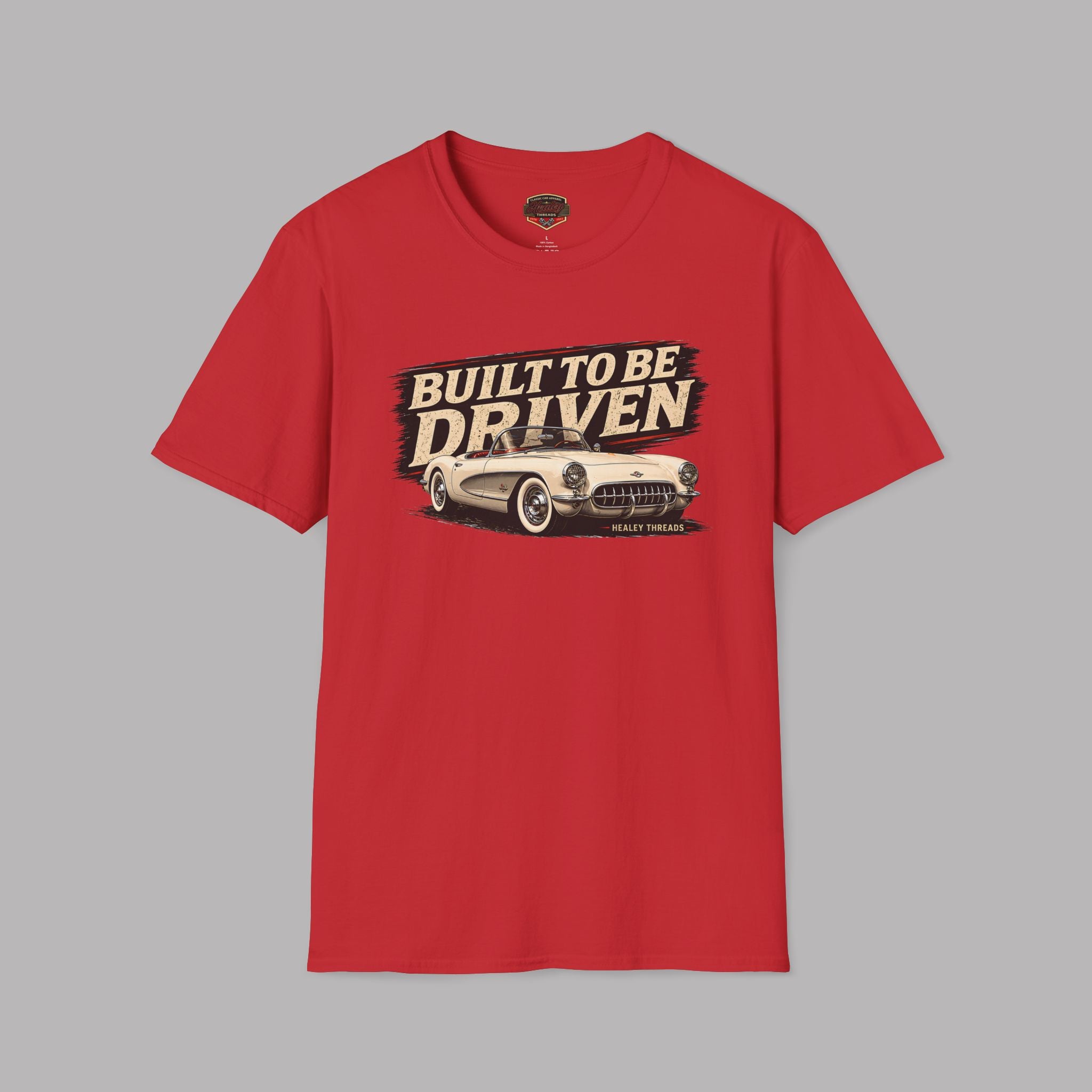Red t-shirt with 'Built to be Driven' graphic on a gray background