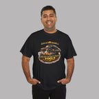 Man wearing a black t-shirt with a classic car graphic design on a gray background
