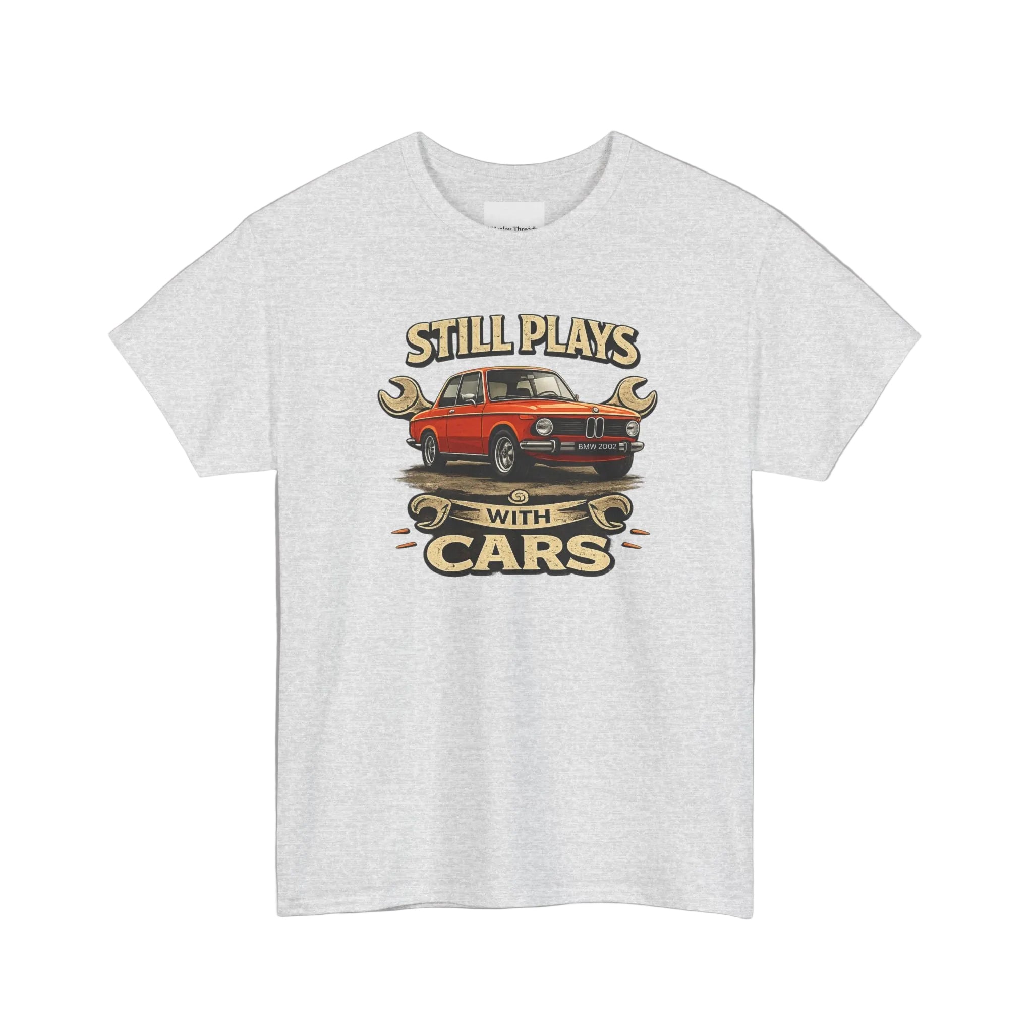 Ash t-shirt with a graphic of a red car and text 'Still Plays with Cars' on a white background