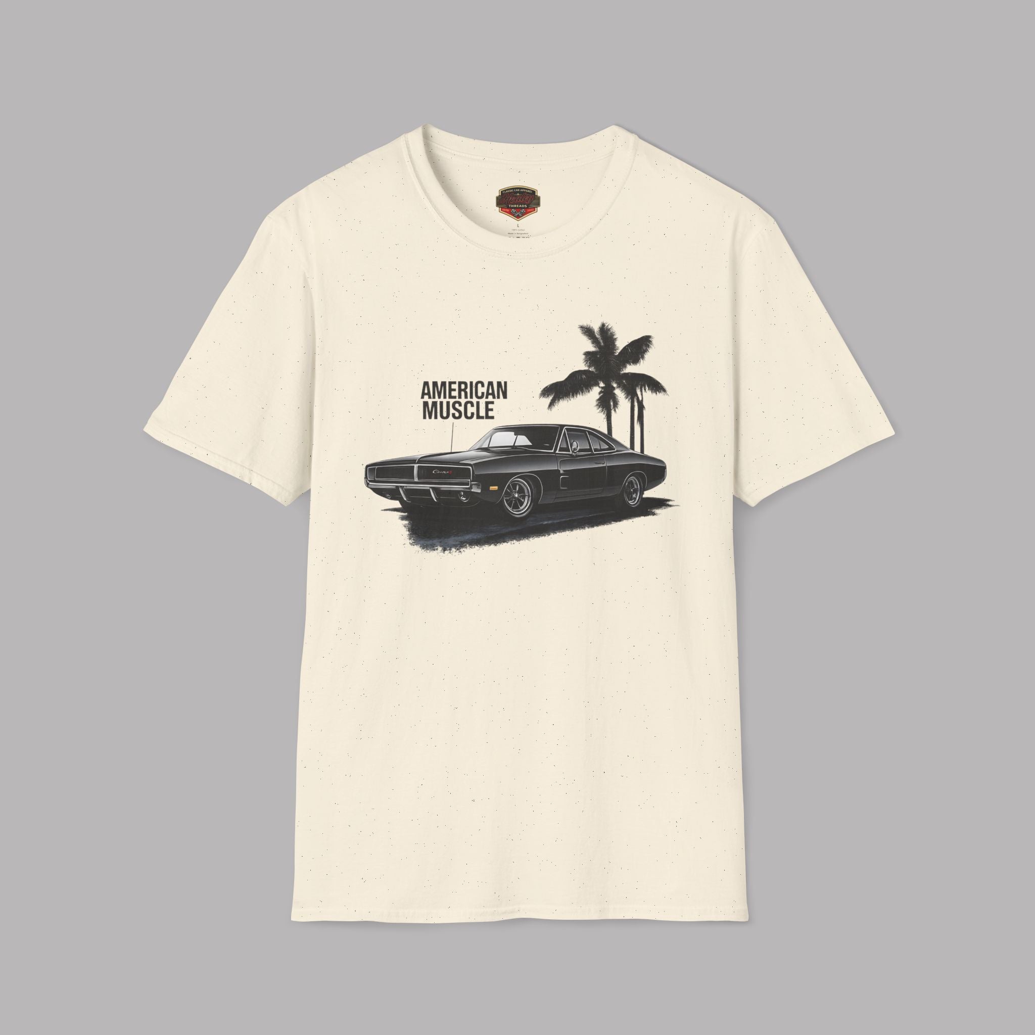 Natural t-shirt with a graphic of a car and palm trees on a gray background
