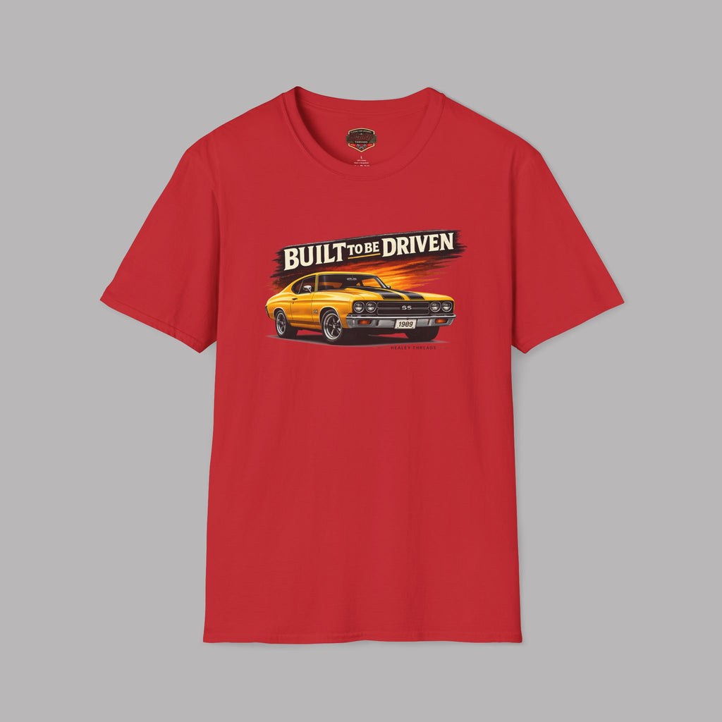 Red t-shirt with a graphic of a car and 'Built to be Driven' text on a gray background