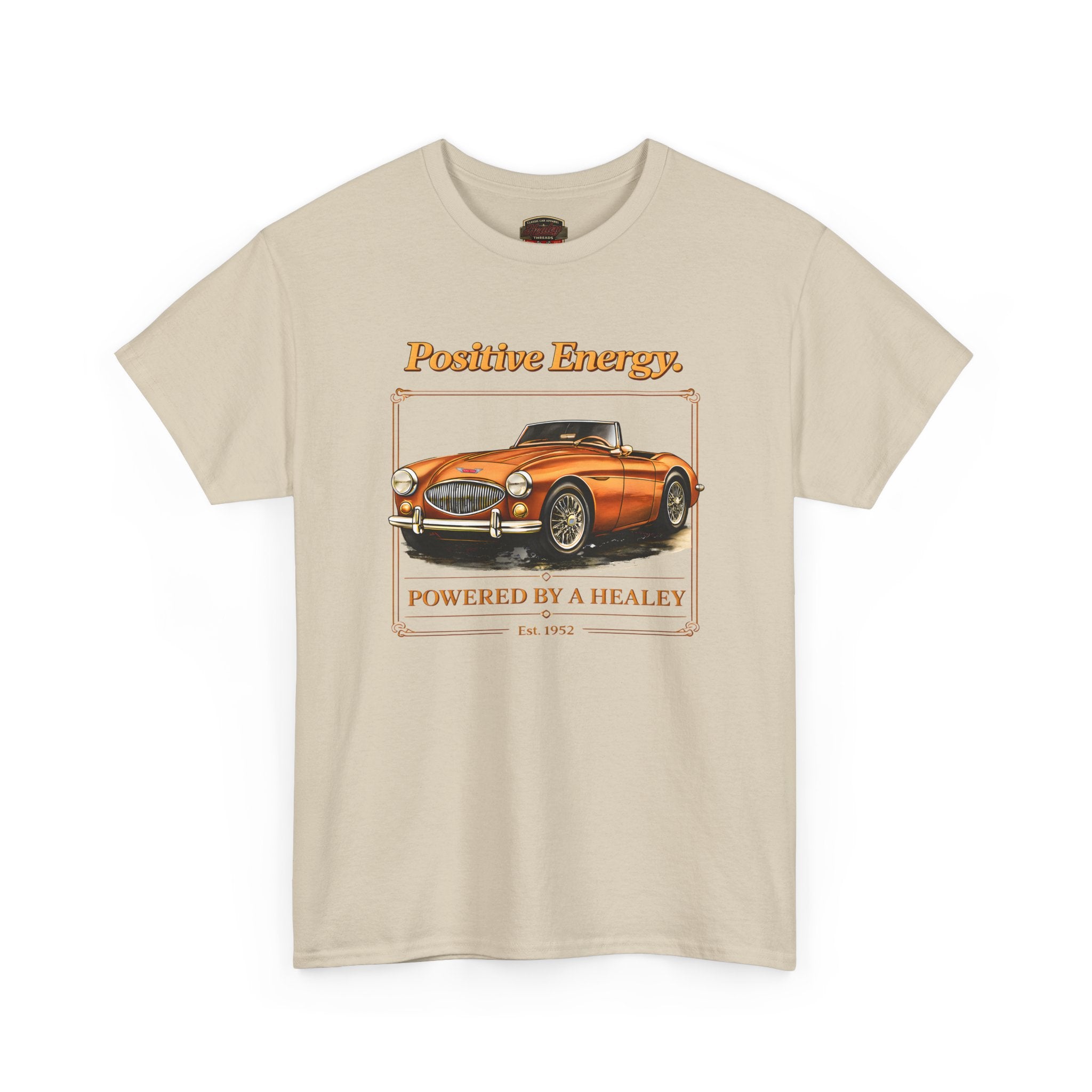 Beige t-shirt with a classic car graphic and 'Positive Energy' text on a white background