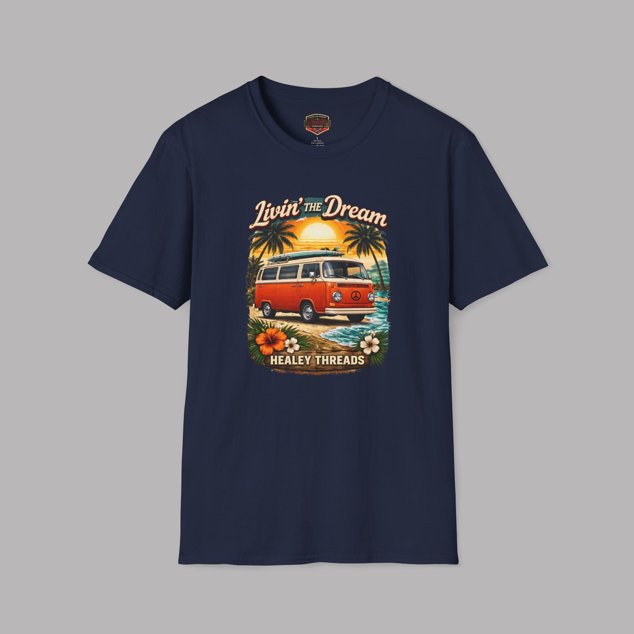 Navy blue t-shirt with a graphic of a van and palm trees on a gray background