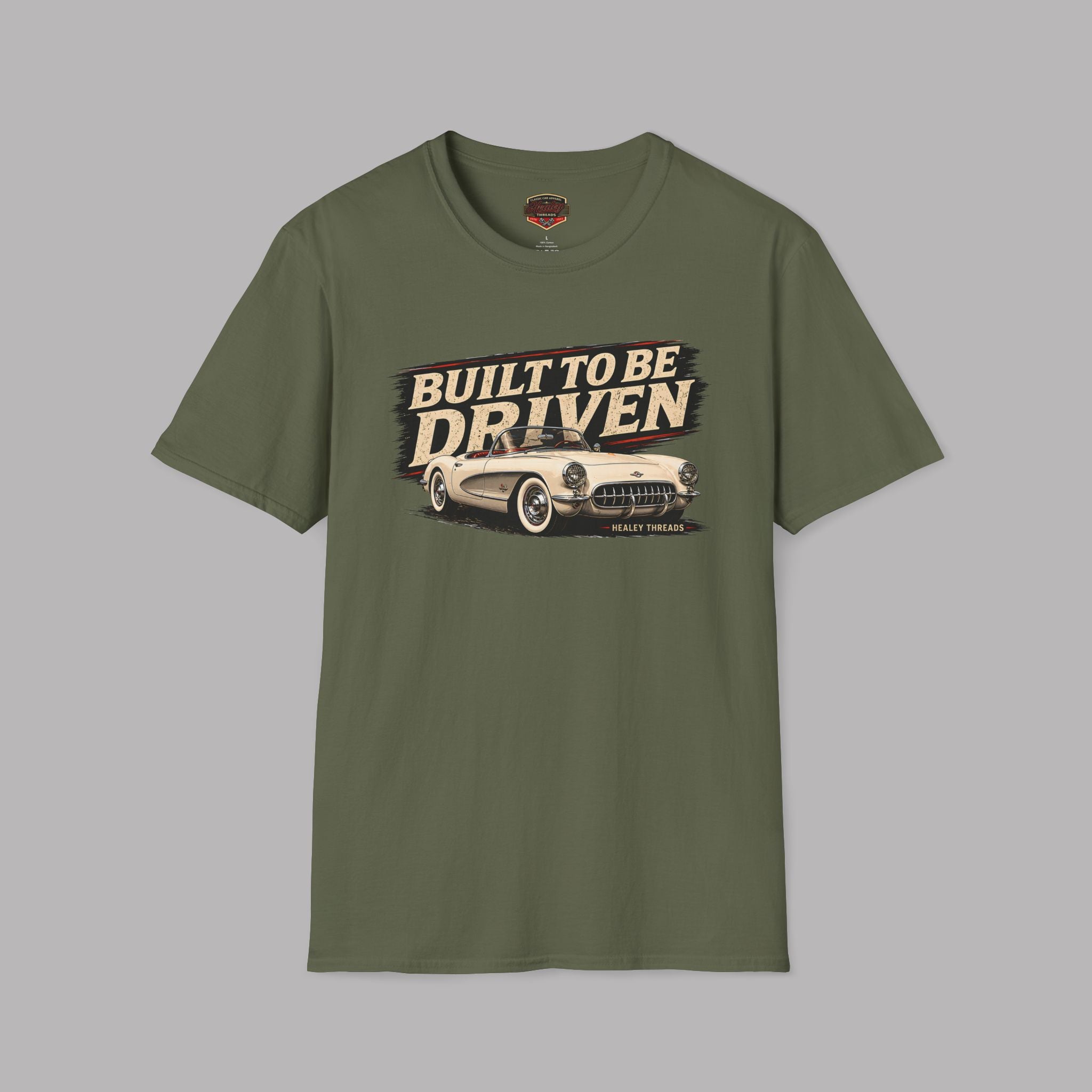 Military green t-shirt with 'Built to be Driven' graphic on a gray background