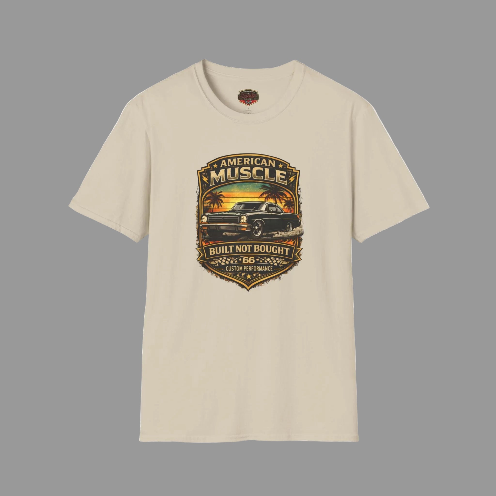 Sand t-shirt with 'American Muscle' car graphic design on a gray background