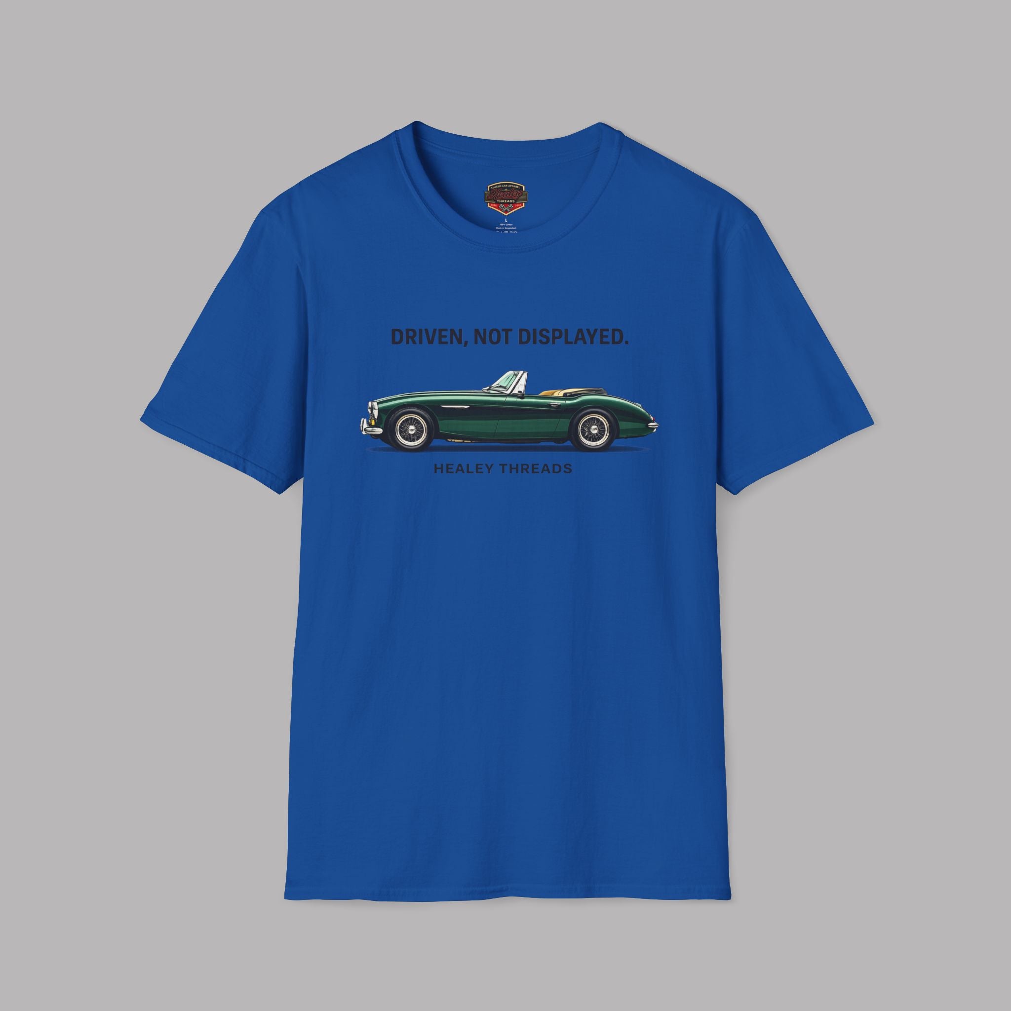 Royal blue t-shirt with a green classic car graphic and text on a gray background