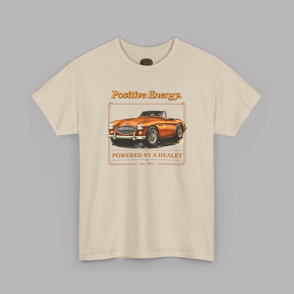 Sand t-shirt with a graphic of a classic car and text on a gray background