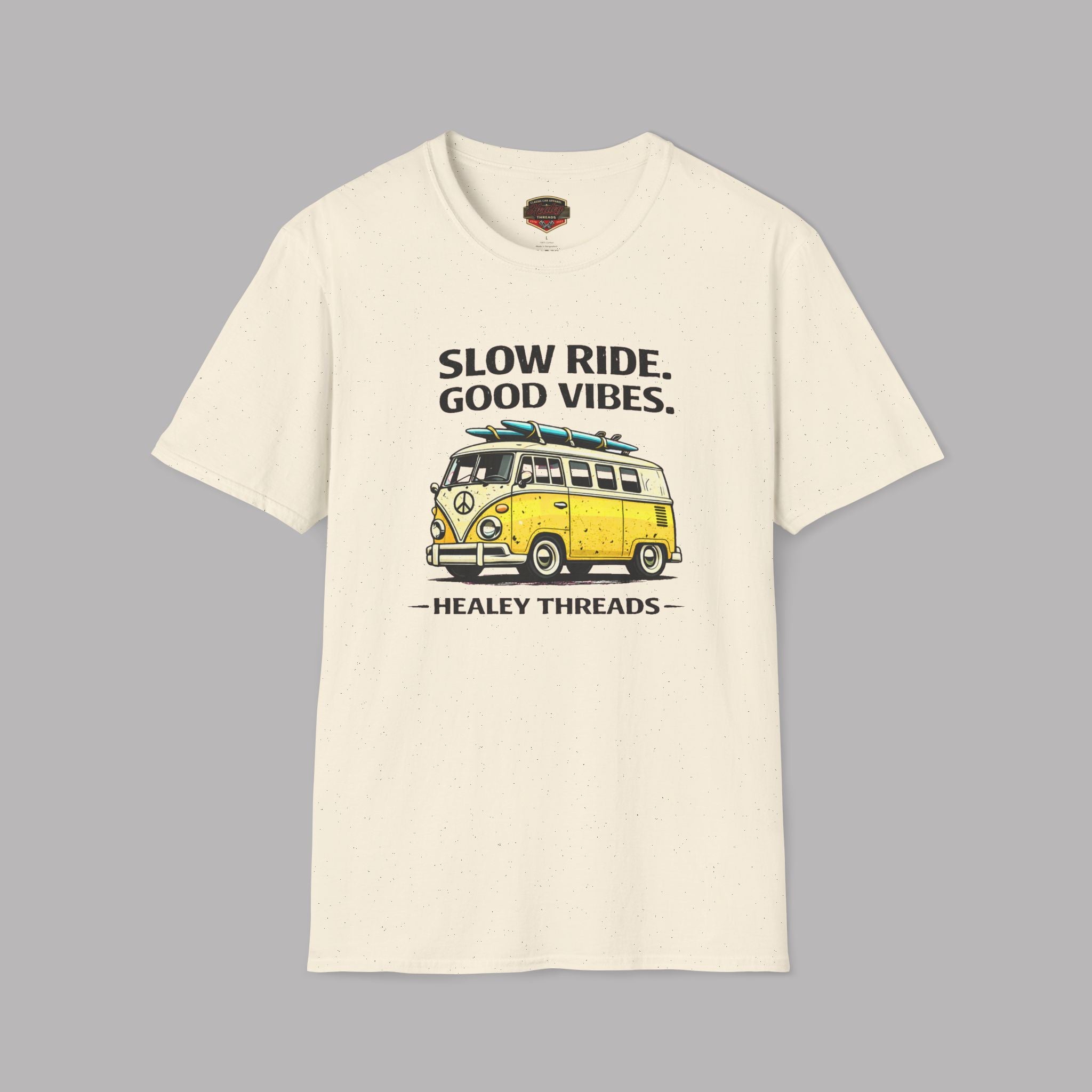 Natural t-shirt with a yellow van graphic and text on a gray background