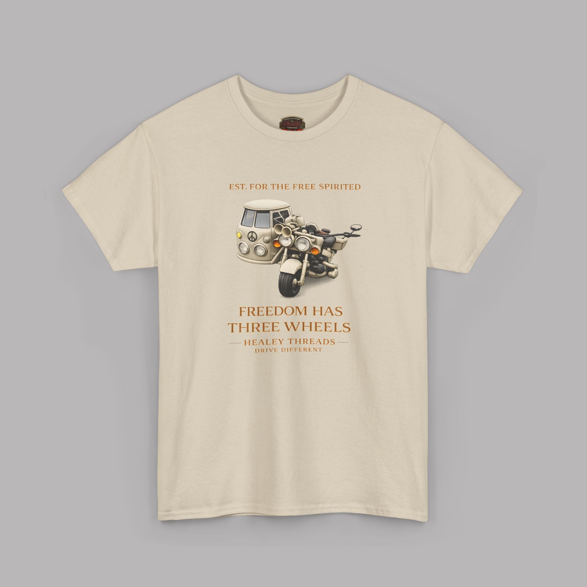 Sand t-shirt with tri bike and motorcycle sidecar  graphic and text on a gray background