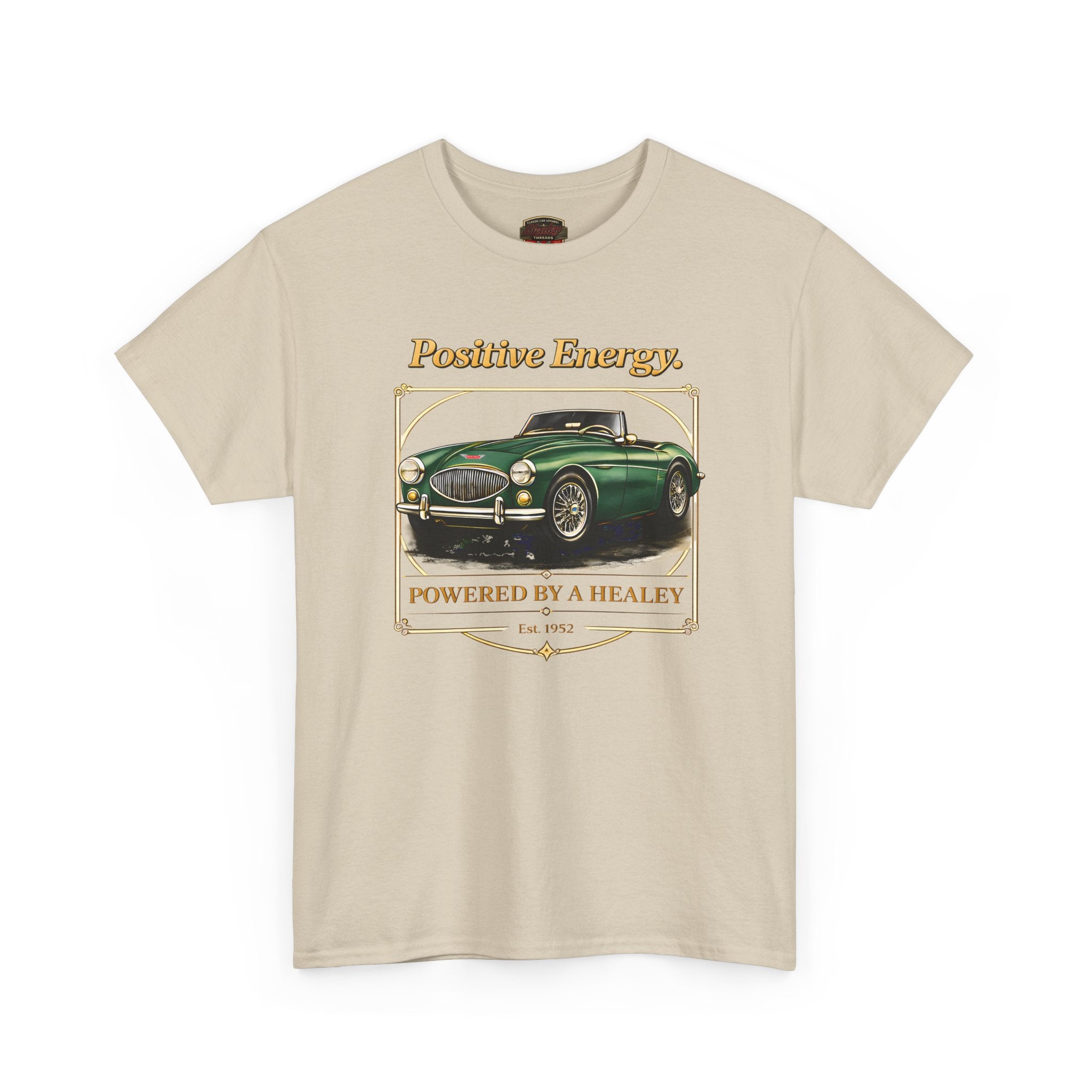 Beige t-shirt with a green classic car graphic and 'Positive Energy' text on a white background