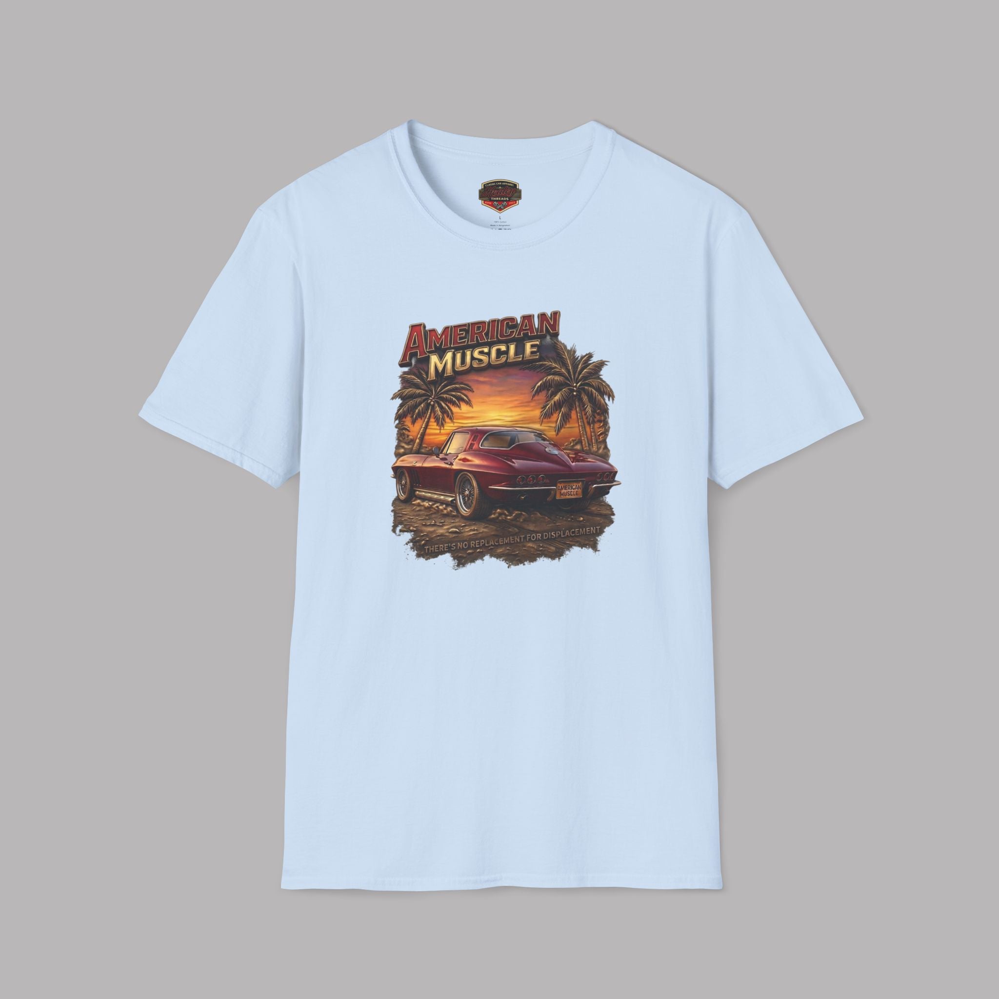 Light blue t-shirt with 'American Muscle' graphic design featuring a muscle car and sunset.