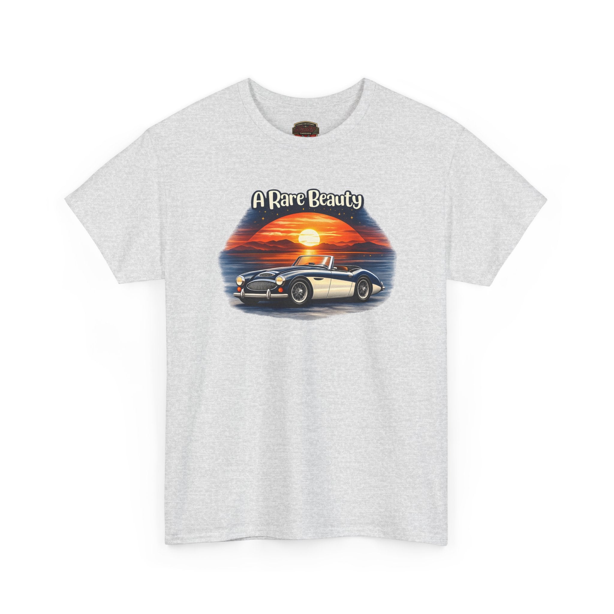 Ash gray t-shirt with a graphic of a classic car and sunset, labeled 'A Rare Beauty', on a white background.