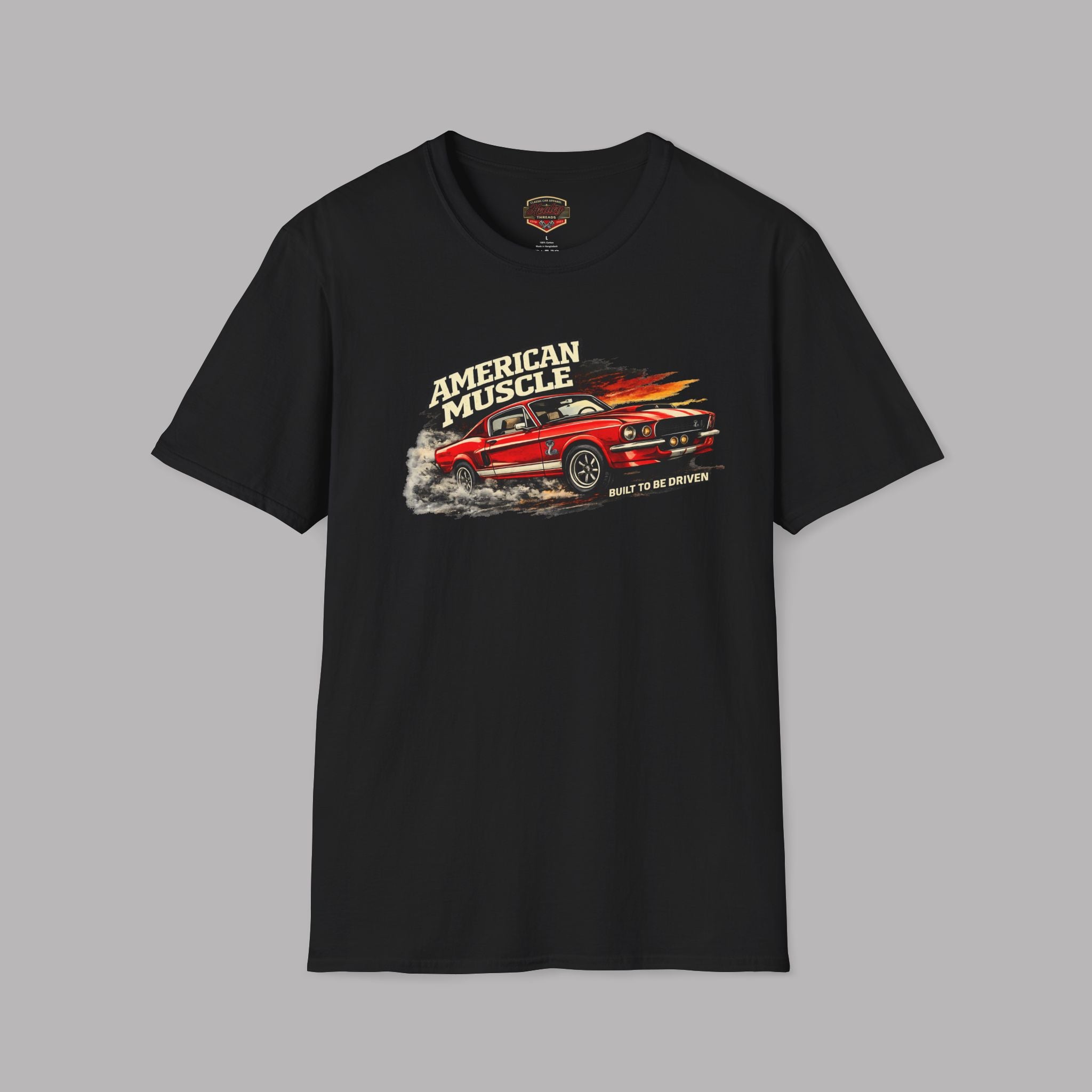 Black t-shirt with a red muscle car graphic and 'American Muscle' text on a gray background