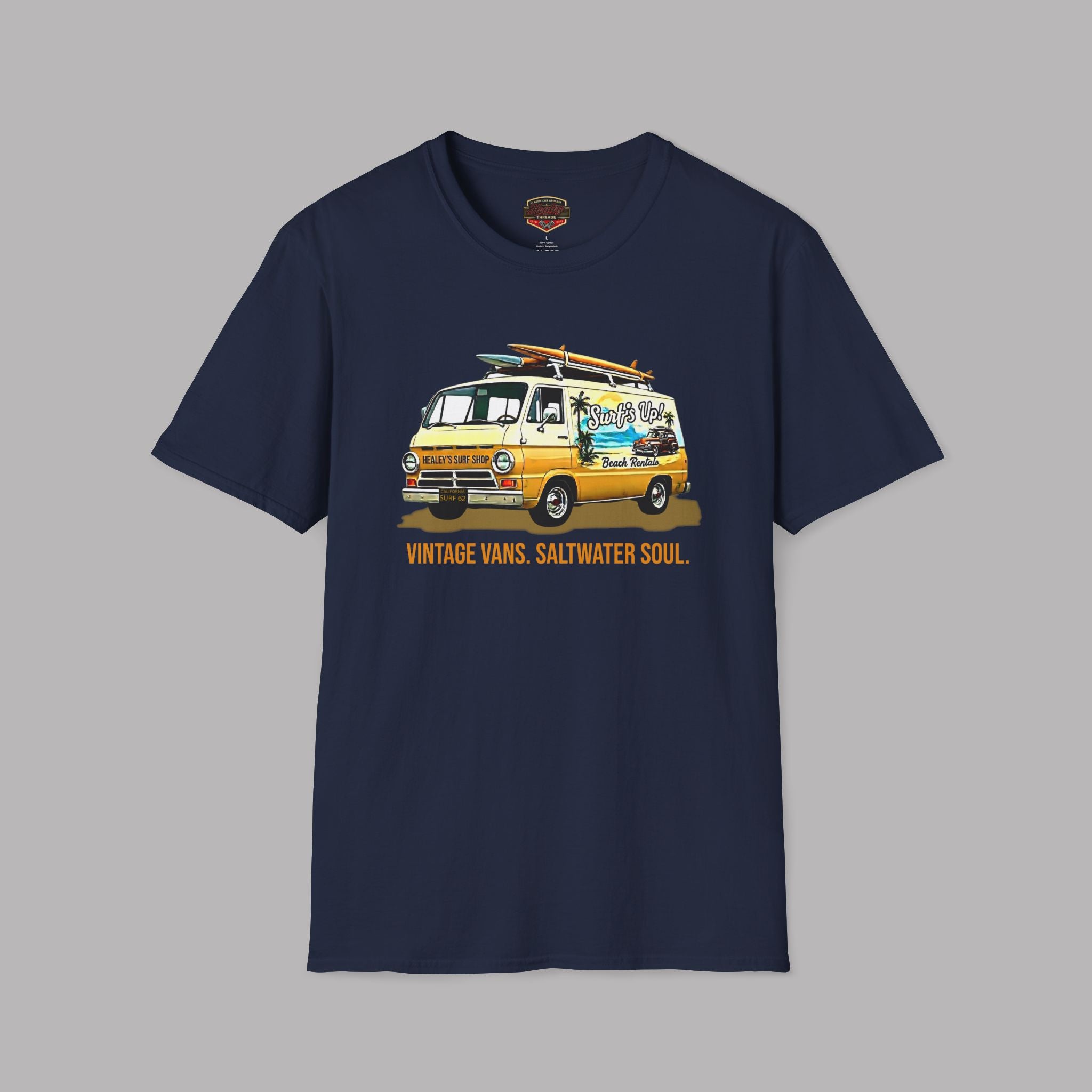 Navy blue t-shirt with a yellow classic van graphic on a gray background