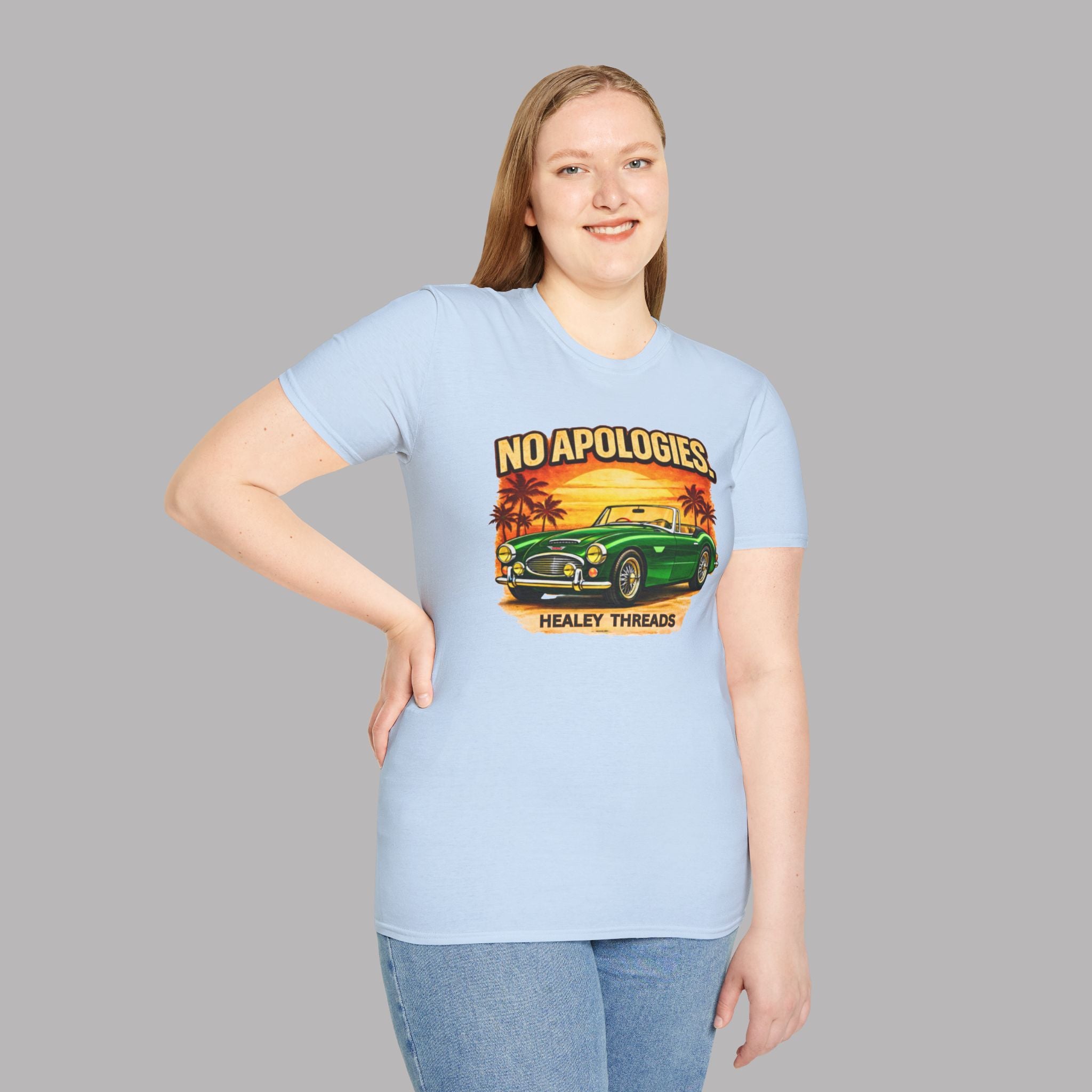 Girl wearing a light blue t-shirt with a graphic Healey car design and text on a gray background