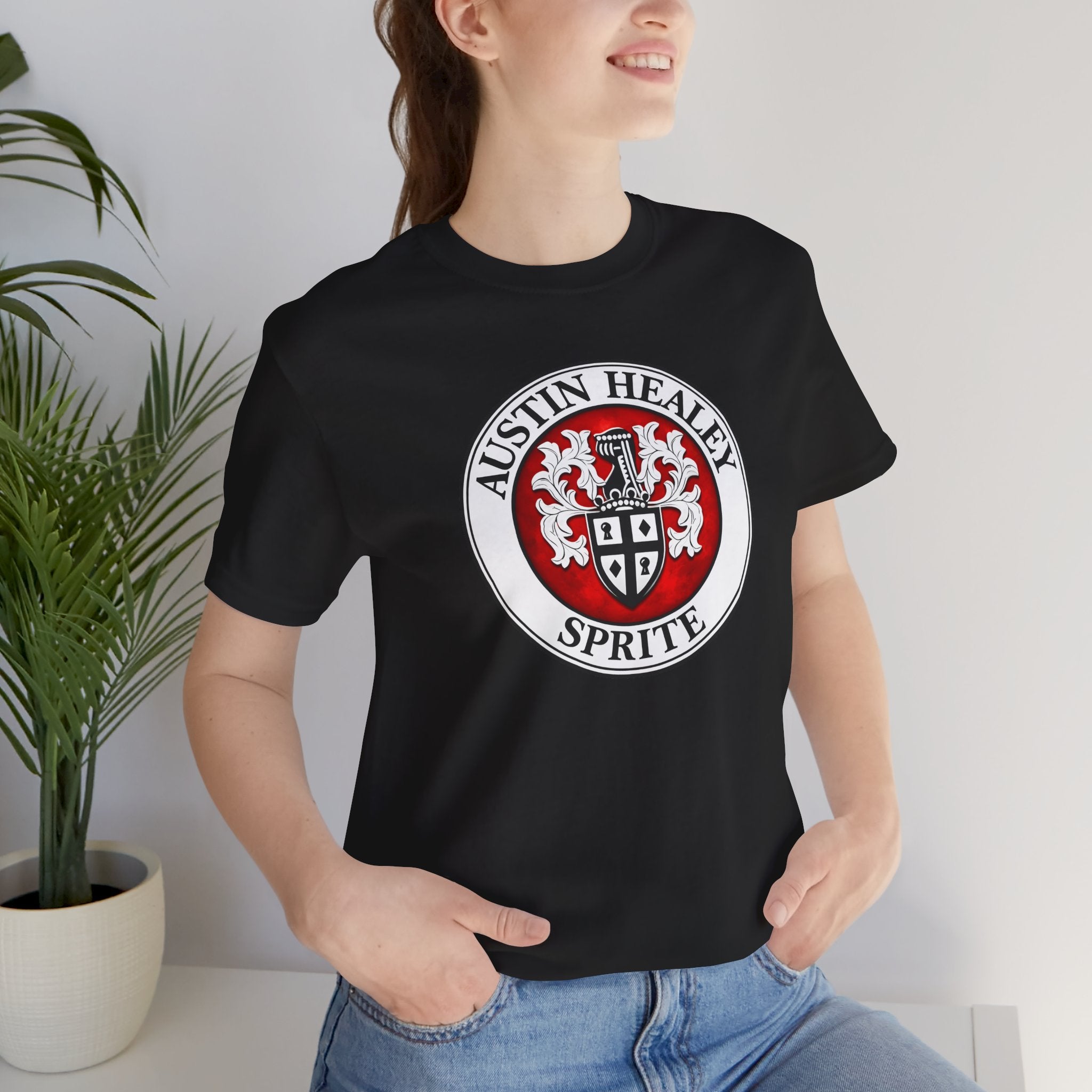 Woman wearing a black t-shirt with Austin Healey Sprite logo