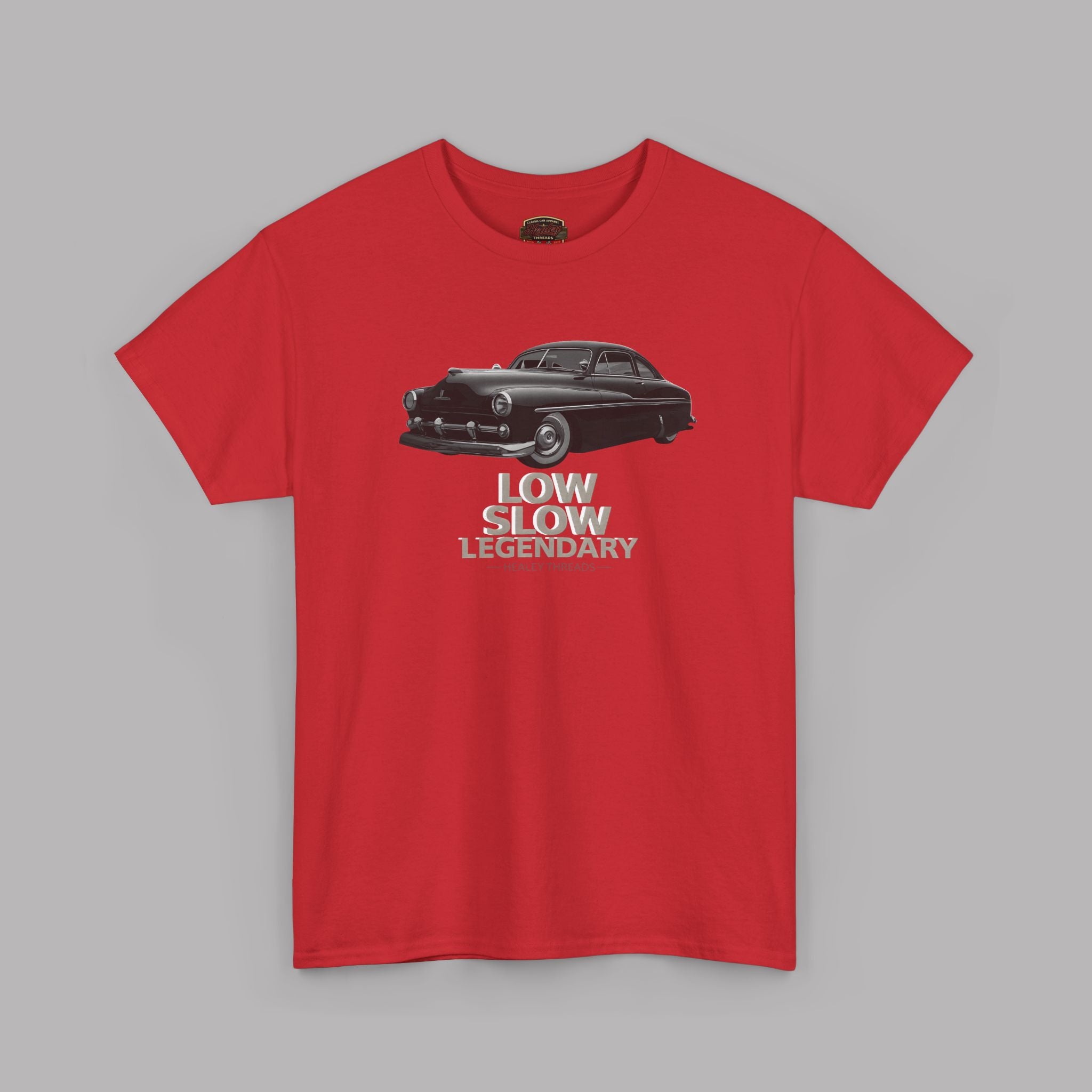 Red t-shirt with a graphic of a car and text 'Low Slow Legendary' on a gray background
