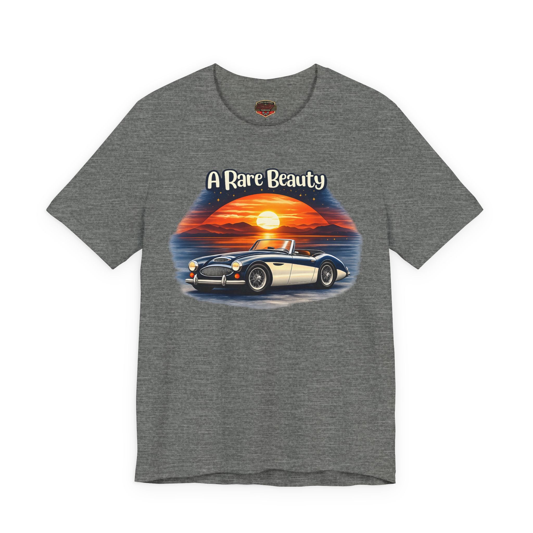 Heather gray t-shirt with a Healey graphic of a car and sunset design on a white background