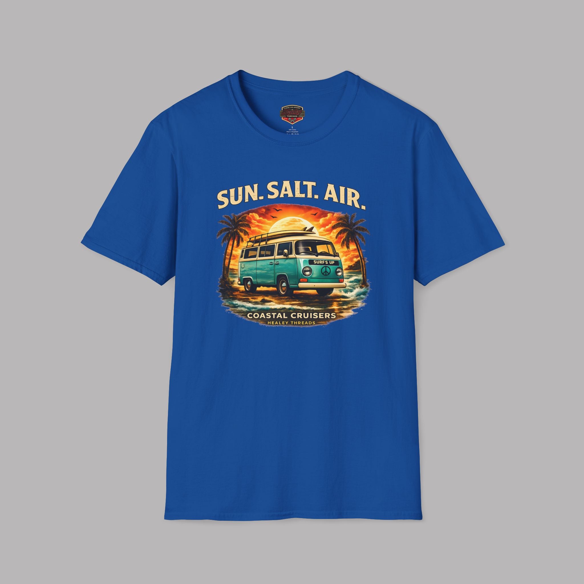 Royal blue t-shirt with a graphic design of a van, palm trees, and text 'Sun. Salt. Air.' on a gray background.