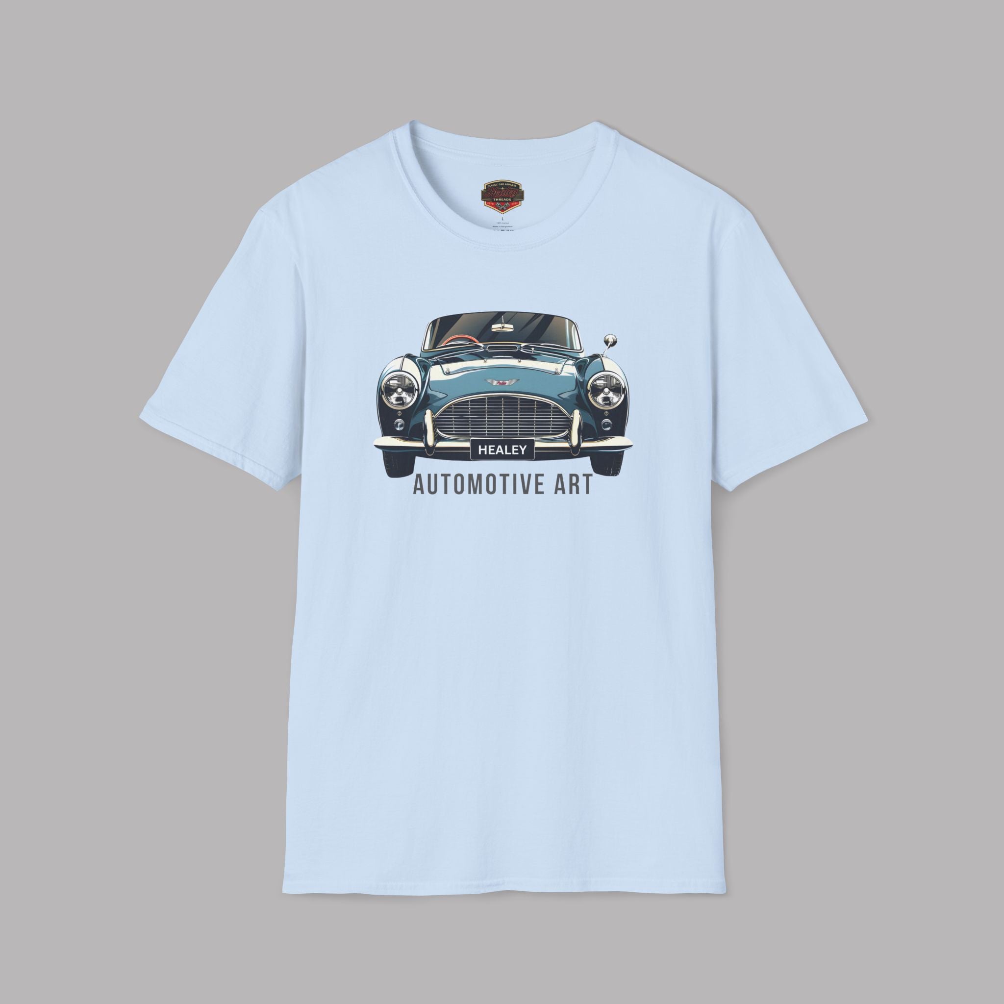 Light blue t-shirt with a vintage car graphic and 'Healey Automotive Art' text on a gray background