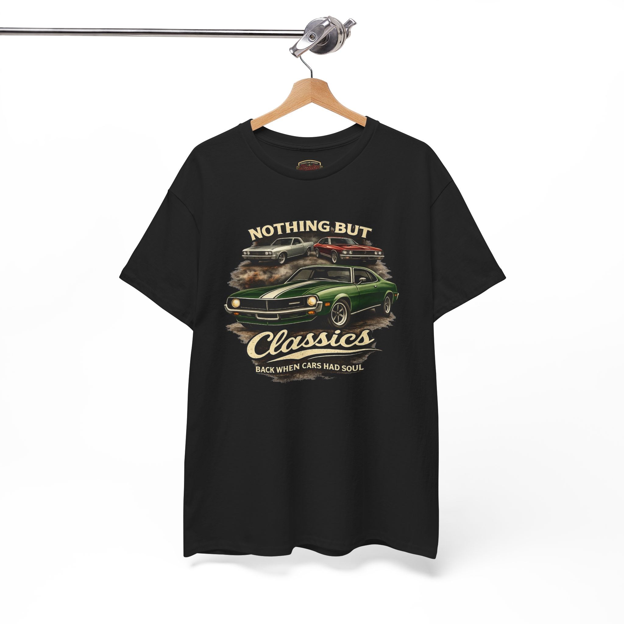 Black t-shirt with classic car graphic and text on a hanger against a white background