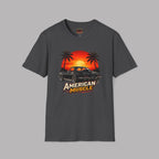 Dark heather t-shirt with 'American Muscle' graphic design featuring a sunset and car on a gray background 