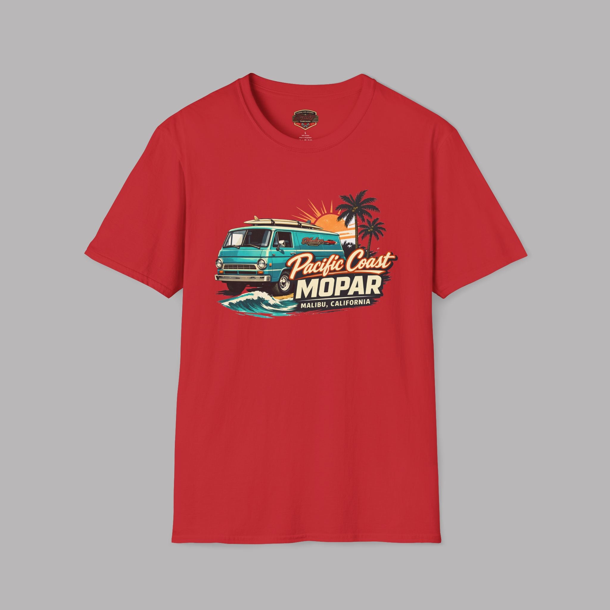 Red t-shirt with a graphic design of a van and text on a gray background