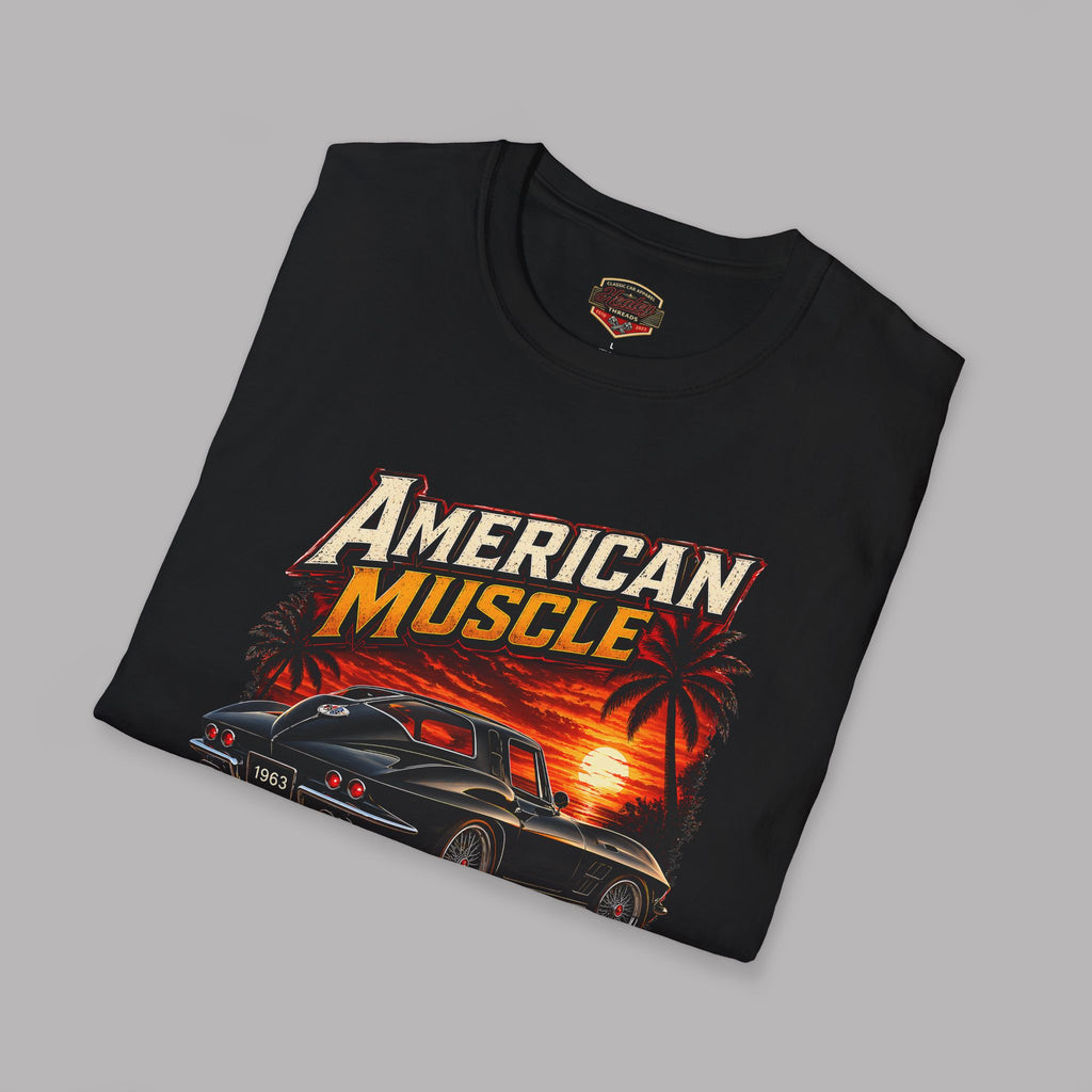 Folded black t-shirt with an 'American Muscle' car graphic design on a gray background
