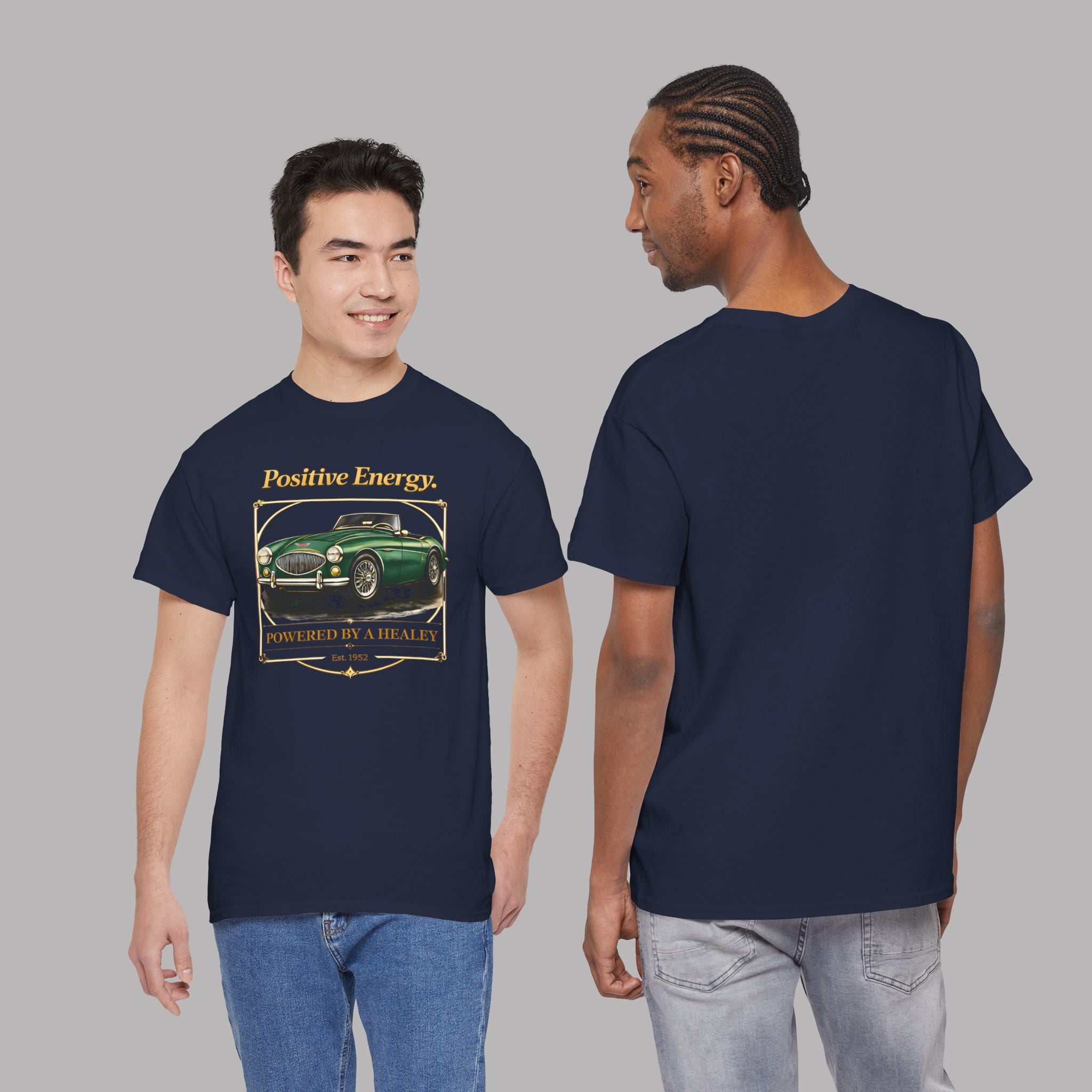 Navy blue t-shirt with a graphic design of a green classic car and text, worn by two models on a gray background.