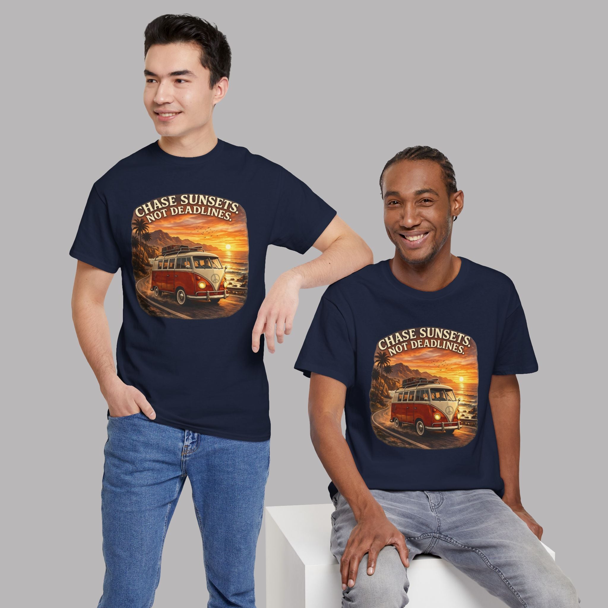 Two people wearing navy blue t-shirts with a sunset and classic red van design and text.