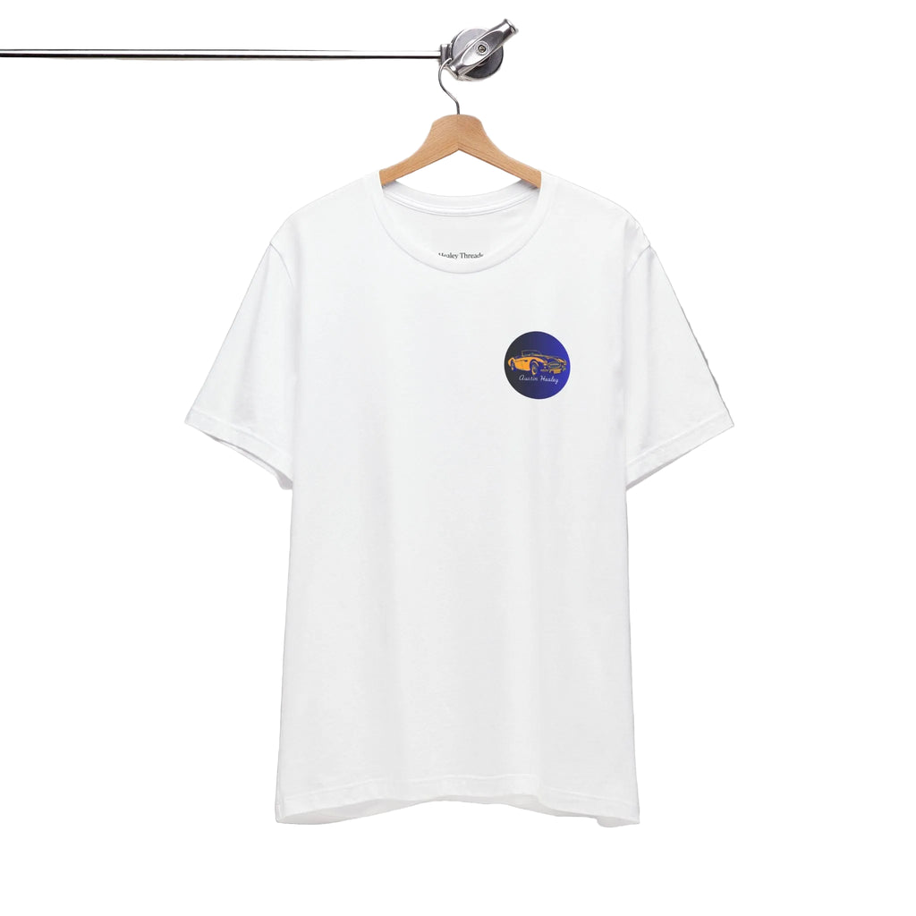 Front view of a white t-shirt with a small logo on a hanger against a white background