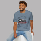 Man wearing a storm blue t-shirt with a graphic car design on a gray background