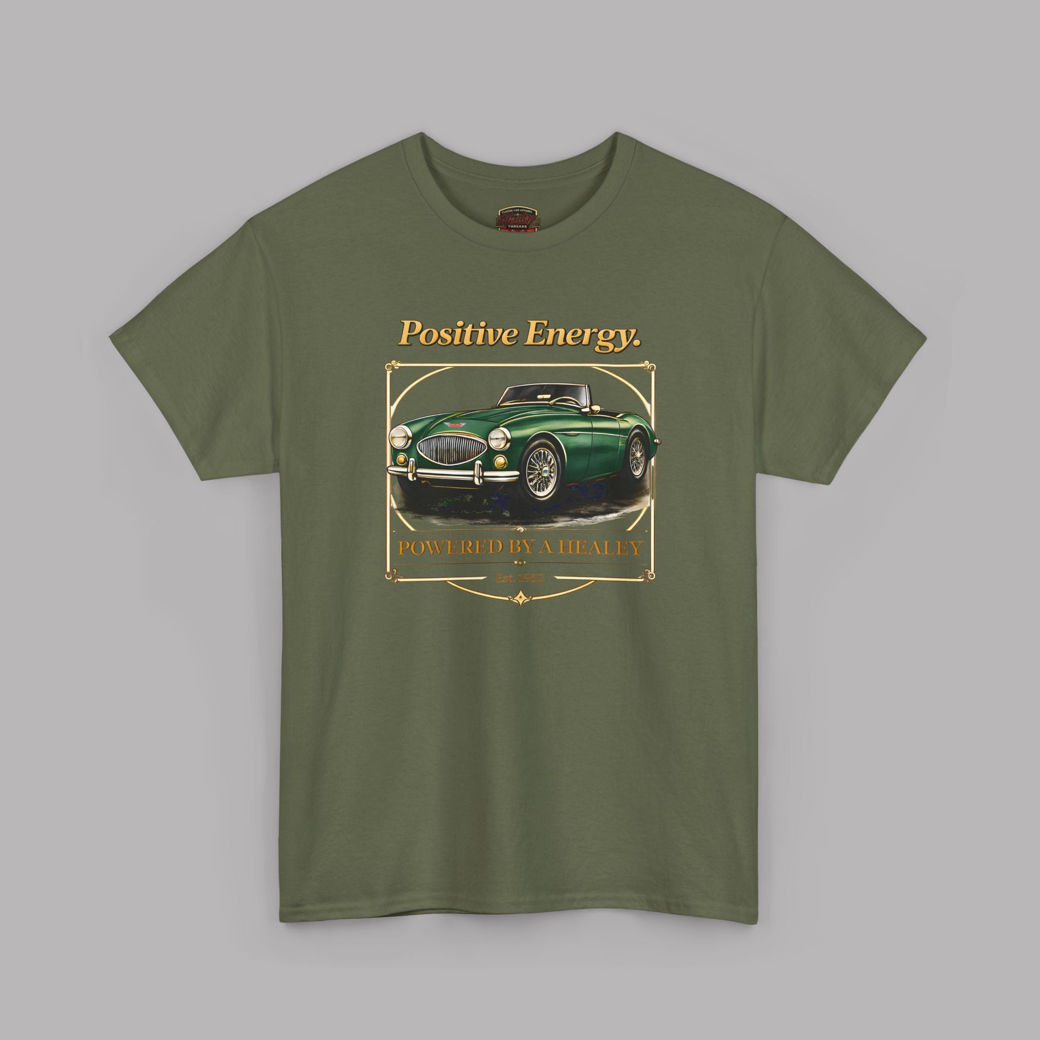 Military green t-shirt with a vintage car graphic and text on a gray background